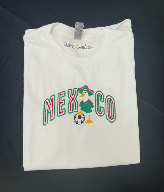 Camisas bordadas de México y el pato Merlin